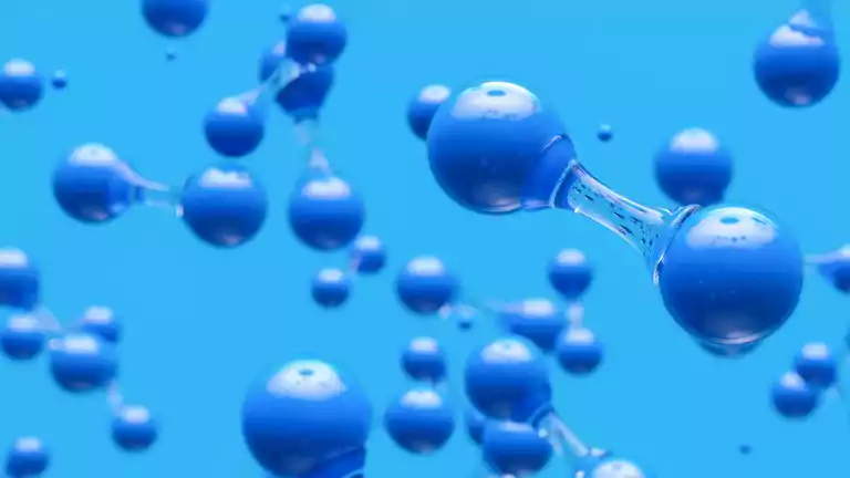 3D illustration of blue water molecules with two connected spheres floating against a light blue background, representing molecular structure and chemistry concepts.
